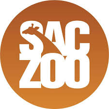 Sacramento Zoo logo on orange circle background, with the silhouette of a giraffe in the center